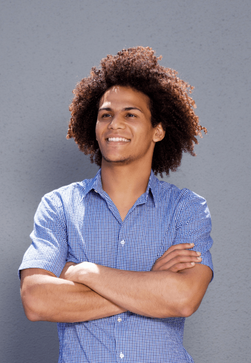 demo-attachment-493-smiling-confident-man-standing-with-arms-crossed-DMBEGAW